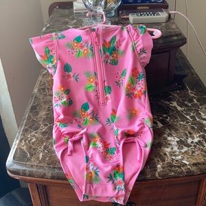 Pink floral swimsuit with zipper in front